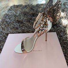 Sophia Webster “Evangeline” Embellished Winged Sandal | White And Rose Gold | Sz 37.5 | 4.25 Heel Height (110mm) Nwb Designer White Sandals For Party, Luxury White Sandals For Party, Sophia Webster Bridal, Luxury Gold Synthetic Heels, Gold Heels Butterfly, Sophia Webster Pearl Heels, Sophia Webster Heels, Sophia Webster Butterfly Heels, Butterfly Heels