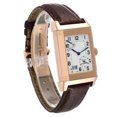 Jaeger LeCoultre Reverso Grande Date Rose Gold Mens Watch 240.2.15 Q3002401 Box Paper. Manual winding movement. Rhodium-plated, 8-day power reserve, twin barrel, straight-line lever escapement, monometallic balance, shock absorber, self-compensating flat balance spring. 18K rose gold 46.0 x 29.0 mm case rectangular rotating case. 18K rose gold ribbed bezel. Scratch resistant sapphire crystal. Silvered matte dial, polished chapter ring, Arabic numerals, engine-turned central zone. Small seconds s Formal Watch With Rectangular Dial And Chronometer, Formal Watches With Chronometer And Rectangular Dial, Brown Rectangular Watch For Formal Occasions, Timeless Rectangular Chronometer Watch, Formal Automatic Watch Accessories With Rectangular Dial, Formal Brown Watch Accessories With Rectangular Dial, Classic Rectangular Watches With Date Display, Rose Gold Analog Watch Accessories For Formal, Rose Gold Analog Watch Accessories For Formal Events