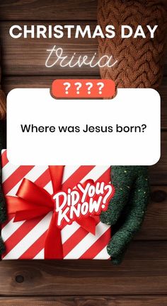 a christmas card with the words where was jesus born? and a present wrapped in red ribbon