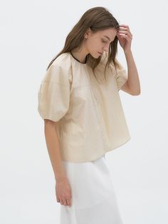 This is a trendy and feminine top by Lamerei that is made out of high quality and sturdy material. With distinctive mood of the design and modern feminine look, you can style it for your comfortable daily outfit.- Puffy sleeves and relaxed fit- Subtle shirring on round neckline- Feminine and modern mood Elegant Beige Tops For Day Out, Chic Spring Puff Sleeve Top For Workwear, Beige Cotton Blouse For Work, Cream Cotton Top For Daywear, Oversized Tops For Spring Daywear, Oversized Effortless Blouse For Spring, Trendy Relaxed Fit Puff Sleeve Top For Work, Elegant Neutral Tops For Day Out, Spring Cotton Puff Sleeve Top For Workwear