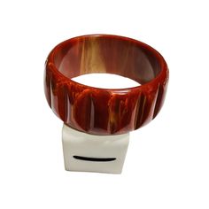 Vintage Carved Notched Bakelite Bangle Bracelet Two Tone Marbled Reddish Brown | eBay Handmade Red Bangle, Elegant Red Round Cuff Bracelet, Vintage Handmade Red Bangle, Vintage Red Adjustable Bangle, Adjustable Red Bracelets For Formal Occasions, Elegant Handmade Red Bangle, Elegant Red Handmade Bangle, Handmade Red Cuff Bracelet For Formal Occasions, Formal Handmade Red Cuff Bracelet