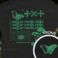 a black shirt with green butterflies on it and the words sugar rush ride sugar rush ride