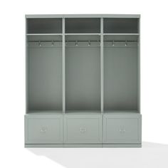 an empty gray closet with three drawers