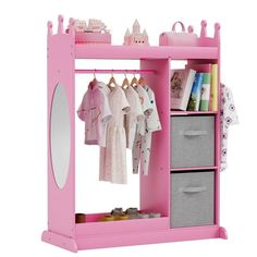 a pink children's closet with clothes hanging on it