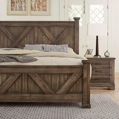 a bedroom with a bed, dresser and two framed pictures on the wall above it