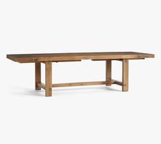 a wooden table with two legs and a long rectangular top, on a white background