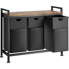 a kitchen island with two bins and a butcher block top on casteor wheels