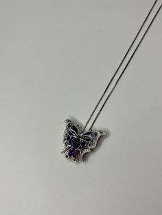 Sterling Silver Amethyst Butterfly Pendant Necklace. This necklace measures 18 inches in length; pendant measures 3/4 inch in length and 1 inch in width; necklace weighs a total of 6.36 grams. Both necklace and pendant are tested and stamped sterling silver. This pre-owned necklace is in good condition and is ready to be worn!  Necklace is exactly as shown in photos.  Willing to answer any questions and send more pictures if requested, please feel free to ask! Please come check out other stunnin Purple Sterling Silver Necklace For Formal Occasions, Purple Hallmarked Necklaces For Gifts, Elegant Purple Necklace Stamped 925, Purple Engraved Sterling Silver Necklace, Purple Sterling Silver Necklace As Gift, Gift Purple Hallmarked Necklaces, Purple Sterling Silver Necklace For Gift, Engraved Sterling Silver Purple Necklace, Formal Purple Pendant Necklace