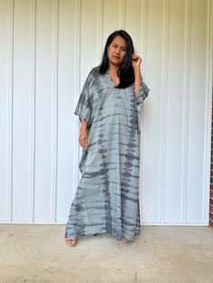 Unwind in absolute comfort with our semi sheer cotton gauze kaftan. This kaftan is perfect for the beach, pool, resort and laid-back time at home. Crafted from quality soft and breathable gauze cotton, it offers an airy fit that's ideal for lounging and cover up. Its relaxed design and easy slip-on style make it your go-to choice for outdoor cover up and relaxed nights at home. V-neck Maxi Dress With Natural Dye For Summer, Bohemian Tunic For Daywear With Relaxed Fit, Bohemian Tunic With Relaxed Fit For Daywear, Casual Flowy Kaftan With Short Sleeves, Casual Flowy Short Sleeve Kaftan, Casual Short Sleeve Flowy Kaftan, Casual V-neck Relaxed Fit Kaftan, Bohemian Flowy Cover-up For Daywear, Flowy Bohemian Cover-up For Daywear