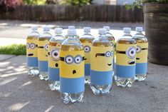 six bottles of water with minion faces on them