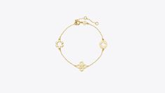 Kira Clover Bracelet: Women's Designer Bracelets | Tory Burch Elegant Good Luck Bracelet Jewelry, Elegant Good Luck Jewelry Bracelet, Clover Bracelet, Designer Bracelets, Free Bracelet, Hinged Bracelet, Luck Charms, Flower Bracelet, Stud Earrings Set