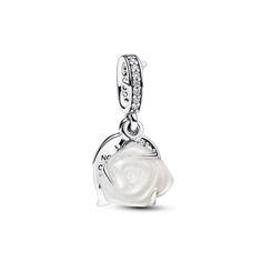 Embrace elegance with the White Rose in Bloom Double Dangle Charm, a sterling silver piece filled with love and symbolism. The intricately designed charm features a white bioresin man-made mother of pearl rose, its layered petals capturing the essence of a blooming flower. Adorned with clear cubic zirconia, this charm is a sparkling tribute to love. The engraved message "NOTHING COMPARES TO YOU" adds a personal touch. The thoughtful details, from the thorn-adorned bail to leaf-shaped discs, make this giftable Pandora Moments charm an enduring symbol of pure love. Mother Of Pearl Rose, Pandora White, Pandora Essence, Charms Pandora, Bracelet Pandora, Pearl Rose, Dangle Charms, Pandora Bracelet, Silver Pieces