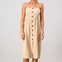 This Super-Soft Tencel Dress Goes With Anything And Everything. Pair It With White Sneakers And A Denim Jacket For A Casual Look Or Dress It Up With Heels For A Daytime Wedding. Features Adjustable Straps And A Non-Functional Button Front. - 100% Tencel Measurements Are Approximate And Taken While Laying Flat Across The Front. Not Doubled. Small - Bust: 14.5”Waist: 13”Length: 41” Medium - Bust: 15”Waist: 14”Length: 41.5” Large - Bust: 16”Waist: 15”Length: 42” Casual Beige Sundress With Adjustable Straps, Casual Dresses With Spaghetti Straps And Button Closure, Casual Sundress With Spaghetti Straps And Buttons, Summer Sundress With Button Closure For Day Out, Casual Spaghetti Strap Dresses With Buttons, Casual Dress With Spaghetti Straps And Buttons, Spring Midi Dress With Buttons And Spaghetti Straps, Spaghetti Strap Sundress With Buttons, Buttoned Midi Sundress For Beach