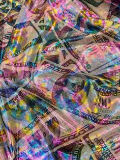 an image of money that is very colorful and interesting to see in this photo, it's all over the place