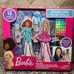 the barbie doll is in its box