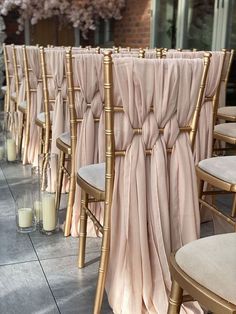 the chairs are lined up and ready for the guests to sit down at their wedding ceremony