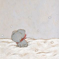 an elephant is sitting in the snow