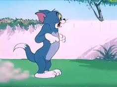 a cartoon cat standing on its hind legs in front of a tree and grass area