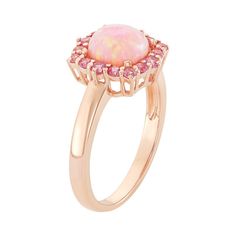 Grace yourself with the feminine beauty of this 18k rose gold-over-silver ring. A lab-created opal stone framed by lab-created pink sapphire stones creates a lovely square halo design.RING DETAILS Width: 12 mm Metal: 18k rose gold over sterling silver STONE DETAILS Stone type: lab-created pink opal, lab-created pink sapphire Shape: cushion, round Setting: prong Gender: female. Age Group: adult.