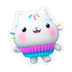 a white cat with sprinkles on it's head is holding a cupcake