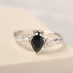 All HANDMADE ITEMS SHIP IN APPROX 8 DAYS Main Stone: Real natural black spinel Main Stone Size: Pear cut 5 mm x 7 mm Main Stone Weight: 0.84 carat Side Stone: None Height From The Ring Setting Bottom(to gemstone top): about 4.9 mm Width of Ring band Measure: gradually varied,about 2.14 mm Material: 925 Sterling Silver/14K White Gold/14K Yellow Gold/14k Rose Gold Engraved: Available For FreeNo more than 13 letters) Customized:Of course! Tell me what you want Includes With Order: All of my store i Bat Creature, Vampire Ring, Blue Topaz Ring Silver, Bat Ring, Halloween Ring, Gothic Ring, Vampire Bat, London Blue Topaz Ring, Gothic Rings