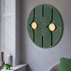 a green circular wall decoration with two yellow lights