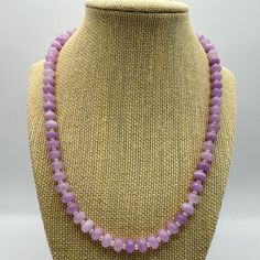 This elegant Lavender Sugar Gemstone Necklace is designed to add a touch of sophistication to any outfit. It features beautiful gemstones that exude a sense of calm and peace. Handcrafted with care, this necklace necklace commands attention, with its adjustable design perfect for layering and a vibrant pop of color to amp up any look! Lavender Natural Stones Jewelry For Meditation, Adjustable Crystal Necklace With Natural Stones, Elegant Adjustable Rose Quartz Crystal Necklace, Spiritual Adjustable Faceted Necklace, Lavender Gemstone Beads Necklace For Gift, Lavender Gemstone Beaded Necklaces For Gift, Lavender Gemstone Beaded Necklaces As Gift, Lavender Amethyst Necklace With Stones, Adjustable Rose Quartz Crystal Necklace