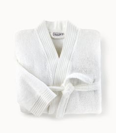 If you're looking for Peacock Alley's softest bathrobe, you've come to the right place. Our Bamboo Bathrobe, in our opinion, is the perfect robe to slip into after a warm shower or bath. 60% Rayon from bamboo / 40% Cotton Constructed with a terry loop for hanging and a corded dobby border detail. Imported from Portugal Dimensions Small/Medium Front chest width: 27"Sleeve length: 20"Length from shoulder: 44" Large/Extra Large Front chest width: 29"Sleeve length: 22"Length from shoulder: 48" Care Cotton Long Sleeve Robe For Spa, White Long Sleeve Bathrobe, White Long Sleeve Bath Robe, Long Sleeve Cotton Robe For Spa, Long Sleeve Cotton Spa Robe, Cozy White Robe For Relaxation, White Cozy Sleep Robe, Cozy White Sleep Robe, White Long Sleeve Robe For Relaxation