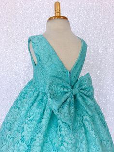 A french laced twist on a classic dress that's perfect for any fancy event or get together! High quality Cord Floral Lace material is used from shoulder to hem and is fully lined to add coverage and comfort. Zipper can be found on the lowest point of the open back. Beneath the lining of the skirt is an additional layer of lining with crinoline attached to add dimension to the dress. The dress is meant to be floor length. FLOWER ORGANZA CROWNS AVAILABLE: https://www.etsy.com/listing/941400982/flo Elegant Fitted Princess Dress For Garden Party, Blue Lace Bodice Princess Dress For Wedding, Blue Princess Dress With Lace Bodice For Wedding, Scalloped Lace Dress For Dress-up Events, Sleeveless Lace Dress For Baptism, Formal Lace Dress With Lace Patchwork, Formal Lace Dress With Bow, Princess Style Lace Dress For Dress-up, Lace Princess Dress For Party With Lace Back