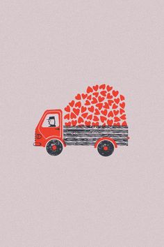 a red truck with hearts in the back