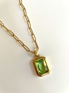 Crafted from luxurious stainless steel, this necklace features a sparkling zircon gem. The perfect addition to any jewelry collection, our necklace exudes sophistication and elegance. Elevate your style with our Colored Gem Necklace today. Elegant Square Pendant Necklace Tarnish Resistant, Elegant Metal Jewelry With Rectangular Pendant, Modern Necklace With Plating As Gift, Elegant Stainless Steel Necklace With Rectangular Pendant, Modern Tarnish Resistant Oval Pendant Necklace, Modern Stainless Steel Jewelry With Square Pendant, Modern Stainless Steel Jewelry With Rectangular Pendant, Modern Stainless Steel Square Pendant Necklace, Modern Stainless Steel Square Pendant Jewelry