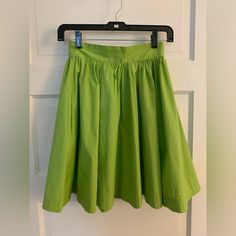 Nwt Trashy Diva High Waisted Green Circle Skirt With Pockets Sz 2 One Small Water Mark Where I Cleaned Up Some Surface Dirt, Should Come Out When Cleaned And Not Noticeable With The Fullness Of The Skirt 97% Cotton 3% Spandex Approximately 11.5” Waist 19” Long Non Smoking Home Fitted Green Pleated Midi Skirt, Green Flared Skirt With Elastic Waistband, Green Flowy Cotton Skirt, Green Knee-length Cotton Skirt, Green Cotton Knee-length Skirt, Casual Green Pleated Full Skirt, Pleated Green Full Skirt, Green Lined Skirted Bottoms, Green Skirted Skort With Lined Skirt