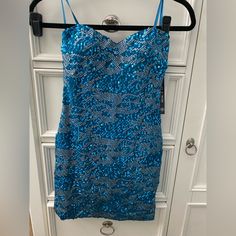 As U Wish Nwt Strapless Blue-Silver Sequins Mini Dress Size Small Fully Lined Padded Bodice Sweetheart Style Tight Fit Pullover Fabric: 93% Polyester And 7% Spandex; Lining: 100% Polyester Pet And Smoke Free Home Blue Strapless Sequin Dress For Prom, Blue Sleeveless Sequin Dress For Homecoming, Blue Mini Sequin Dress For Homecoming, Glamorous Strapless Blue Mini Dress, Glamorous Blue Strapless Mini Dress, Blue Strapless Sequin Evening Dress, Blue Strapless Sequin Dress For Evening, Blue Strapless Sequin Dress, Glamorous Style, Glamorous Blue Strapless Sequin Dress