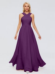 a woman wearing a long purple bridesmaid dress