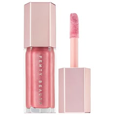 An ultimate, gotta-have-it lip gloss with explosive shine that feels as good as it looks.Highlighted Ingredients: - Shea Butter: Conditions skin. Ingredient Callouts: Free of parabens and phthalates. This product is also cruelty-free.What Else You Need to Know: This universal lip luminizer delivers explosive shine in six shades that flatter all skin tones. One swipe of Gloss Bomb’s XXL wand leaves lips looking instantly fuller and smoother. The non-sticky formula is super shiny, and has an addic Lip Gloss Sephora, Alat Makeup, Beauty Make-up, Luminizer, Eyeshadow Tutorial, Beauty Inside, Benefit Cosmetics, Fenty Beauty, Pink Lips