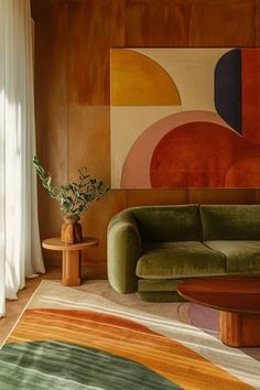 a living room filled with furniture and a painting on the wall