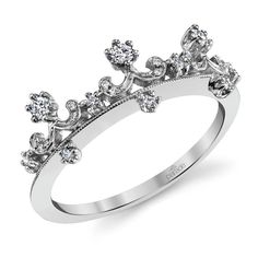 a white gold ring with diamonds on it