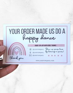 someone holding up a business card that says, your order made us do a happy dance