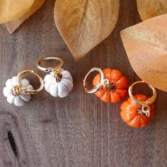 ⚘ Pumpkin Earrings - Show your love for autumn with these tiny pumpkin huggie hoops.  ⚘ Each earring in my shop is designed and handcrafted by me!  ⚘ Hypoallergenic 18k gold hardware ⚘ Lightweight polymer clay ⚘ Remove before showering or swimming ⚘ Please contact me directly with any issues regarding your order ⚘ Free Shipping on orders $35+ ⚘ Visit my shop for more cozy accessories & gifts     Thank you for visiting! ❤ https://www.instagram.com/auggie.art/  https://www.youtube.com/@auggieart Polymer Clay Thanksgiving Earrings, Thanksgiving Clay Earrings, Clay Huggie Earrings, Fall Polymer Clay Ideas, Food Polymer Clay, Autumn Earrings, Earring Inspo, Gold Pumpkins, Earrings Hypoallergenic