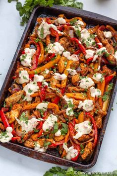 chicken fajita casserole with sour cream sauce and fresh cilantro