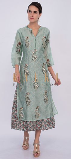 Buy Online from the link below. We ship worldwide (Free Shipping over US$100) Click Anywhere to Tag Cambridge blue cotton tunic dress with butti only on Kalki Cambridge blue cotton tunic dress.The under layer is featured in printed butti in floral and moroccan motif.The attached top layer is adorn with floral printed butti further adorn with gotta patch embroidery . Kurta And Sharara Set, Kurta And Sharara, Kurtis For Women, Cotton Tunic Dress, Kalki Fashion, Kurta Design, Salwar Kamiz, Cotton Tunic