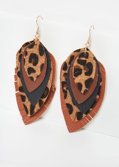 This botanical pairing of our leaf drop earrings successfully combines trendy animal print faux fur with textured faux leather instantly adding a fresh off the runway vibe to any outfit. Leather Fringe Earrings, Leather Leaf Earrings, Fall Leather, Red Holiday Dress, Leather Leaf, Faux Leather Earrings, Earrings Trendy, Layered Fashion, Trendy Chic