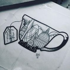 a drawing of a coffee cup with a cityscape in the background and a tag attached to it