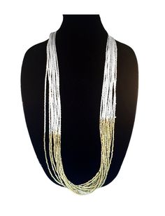 LONG AND LAYERING WHITE & GOLD NECKLACE This is a gorgeous multi-strand white and gold beaded necklace . The beading is done all by hand and took around a week and a half to complete. This necklace also includes a lobster hook for easy closure **The Necklace is 35 inches in length Thank you for your appreciation. All jewelry comes in gift boxes or gift bags Go back to Storefront Taneesijewelry.etsy.com View my Entire STERLING SILVER EARRINGS Collection at https://www.etsy.com/shop/taneesijew Elegant White Beaded Chain Layered Necklace, Gold Multi-strand Jewelry With Polished Beads, Multi-strand Gold Beaded Necklace For Jewelry Making, Multi-strand Gold Beaded Necklaces For Jewelry Making, Double Strand Gold Beads Jewelry, Elegant White Multi-strand Long Necklace, Multi-strand Gold Beads Jewelry Gift, Multi-strand Gold Beads Costume Jewelry, White Long Necklace In Costume Jewelry Style