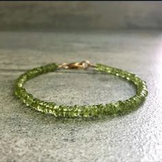 New Gorgeous!! Genuine Peridot Bracelet In Gold Plating Over Sterling Silver. Bracelet Has An Extension On The Clasp. Perfect For Yourself Or As A Gift. Very Shiny And Brilliant!! Very Unique And Different! Suitable For Most Ages. Suitable For All Occasions. Perfect Bracelet For Layering. Nwt Green Peridot Stackable Jewelry, Stackable Green Peridot Jewelry, Green Gemstone Rondelle Beaded Bracelets, Green Stackable Bracelets Gift, Green Stackable Bracelets For Gift, Green Faceted Round Bead Bracelets, Green Rondelle Bracelets For Jewelry Making, Green Faceted Bracelets, Adjustable Peridot Bracelets For Gifts