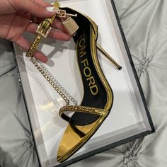 New In Box - Tom Ford 100mm Gold Chain Padlock Sandals Size: 36.5 Color: Gold Heel: 4” Designer Gold Heels With 4-inch Heel, Gold High Heels With Chain Strap, Luxury Heels With Chain Strap For Party, Designer Heels With Chain Strap For Party, Gold Heels With Chain Strap For Party, Designer Gold Heels With Chain Strap, Gold Party Heels With Chain Strap, Gold Pointed Toe Heels With Chain Strap, Gold Heels With Chain Strap And Pointed Toe