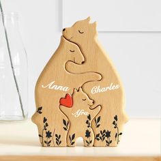 Custom Name Personalization - Create a one-of-a-kind family keepsake with this custom name wooden bear family puzzle. You can personalize it with your family members' names, adding a unique touch to your home decor. Multiplayer Animal Figurine - This wooden bear family puzzle isn't just a decorative piece; it's a fun multiplayer game as well. Assemble the bear figurines with the names of your loved ones, bringing everyone together for an enjoyable activity. Family Home Decor - Elevate your ... Family Gifts For Christmas, Family Puzzle, Family Home Decor, Family Puzzles, Personalized Family Gifts, Wooden Bear, Christmas Gifts For Parents, Hobby Gifts, Bear Family