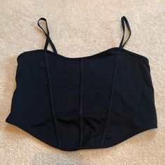 Soft And Stretchy Corset Top Perfect For Going Out Measurements: 16in Length, 11in Pit To Pit Fabric: 94% Nylon And 6% Spandex Condition: Excellent, Never Worn Fitted Nylon Crop Top For Gym, Fitted Nylon Tank Top For Night Out, Fitted Nylon Crop Top Bra Friendly, Fitted Black Elastane Tank Top, Black Nylon Crop Top For Spring, Stretch Nylon Crop Top With Built-in Bra, Fitted Nylon Crop Top With Built-in Bra, Black Fitted Crop Top With Built-in Bra, Fitted Black Crop Top With Built-in Bra