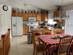 the kitchen is clean and ready to be used for dinner or other special occasion in someone's home