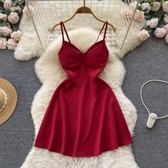 This flirty red spaghetti strap mini dress is a perfect blend of chic and playful style. Featuring a structured bust with a sweetheart neckline, the bodice offers support and shape, creating a flattering silhouette. The slim spaghetti straps add a delicate and feminine touch to the dress, making it ideal for casual outings or a night out with friends.Designed with a classic A-line shape, this dress accentuates the waist while allowing for a comfortable and free-flowing skirt. The soft fabric hug Fitted Backless Suspender Dress With Adjustable Straps, Red Spaghetti Strap Dress With Corset Back, Red Dress With Spaghetti Straps And Corset Back, Fitted Suspender Dress With Spaghetti Crisscross Straps, Red Party Dress With Adjustable Straps, Fitted Suspender Dress With Crisscross Spaghetti Straps, Fitted Halter Neck Sleeveless Dress With Straps, Backless Suspender Dress With Built-in Bra For Date Night, Date Night Backless Suspender Dress With Built-in Bra